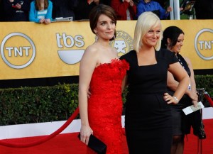 Tina Fey in Oscar de la Renta with Amy Poehler on the red carpet at the 17th Annual SAG Awards, 2011.