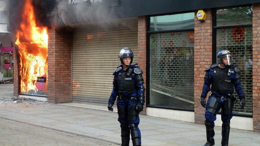 Rioters Storm British Retailers