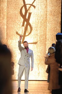 Stefano Pilati takes a bow at his last Yves Saint Laurent show in Paris