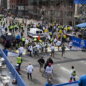 Police and emergency workers clear out Copley Square in 2013.