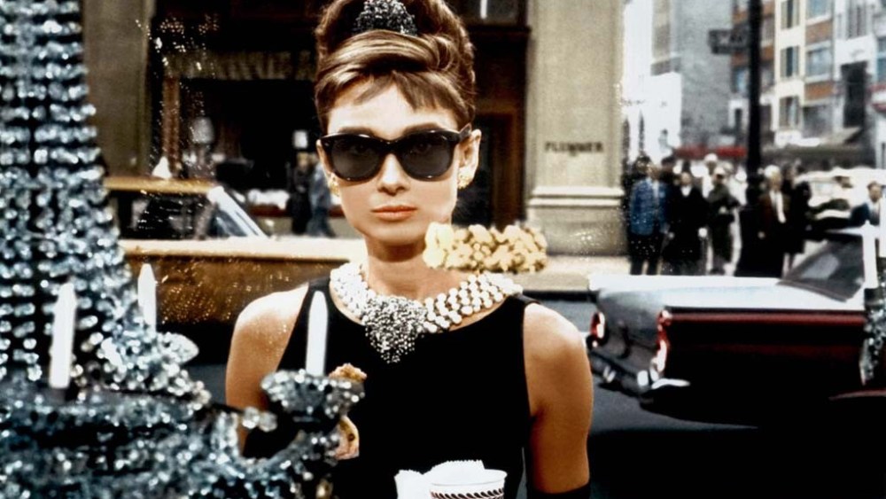Audrey Hepburn as seen through the windows of Tiffany & Co's Landmark windows.