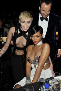 Miley Cyrus and Rihanna, both in Tom Ford, with the designer