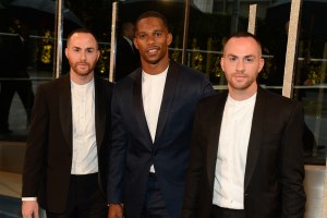 Victor Cruz in Ovadia and Sons with the designers at 2015 CFDA Fashion Awards Red Carpet