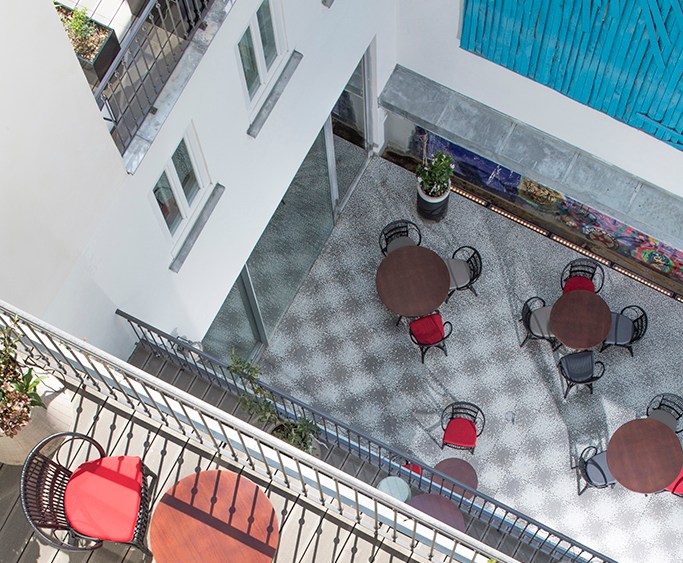 Les Bains balconies and courtyard