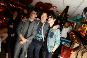 Joe Jonas and Darren Criss, both wearing Richard Chai, with the designer.