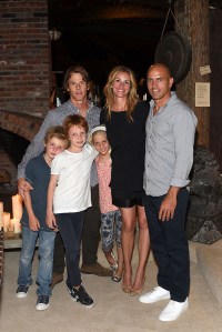 Julia Roberts and Danny Moder with their kids and Kelly Slater.