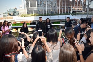 3:41 p.m.: Mostly Asian superfans are lined up by the arrival area and they start screeching as someone pulls up. “It must be the Justin Bieber of China?” I overhear.