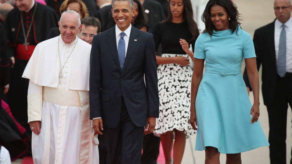 Pope Francis escorted by President Obama, FIrst Lady Michelle Obama and daughters.