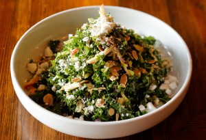 The Pomeroy's kale and brussel sprouts with toasted almonds, ricotta salata, apple, red onion.