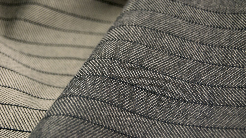 Cotton Incorporated's black and gray horizontal pinstripe.