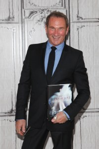 Hal Rubenstein with his book, "The Looks of Love: 50 Moments in Fashion That Inspired Romance."
