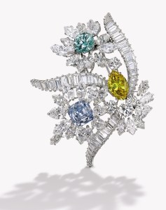 Platinum, fancy colored diamond and diamond brooch, Bulgari.