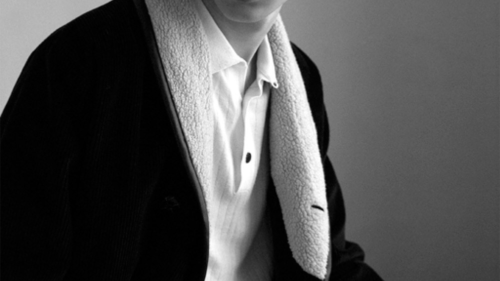 The brand’s signature shawl-collared jacket