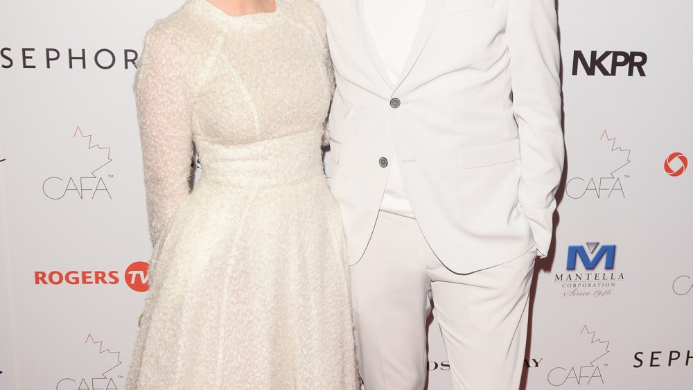 Elisha Cuthbert in Matthew Gallagher with designer.