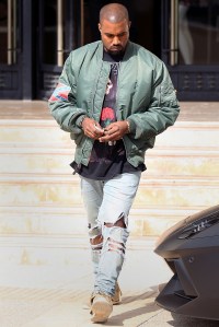 Kanye West wearing Alpha Industries MA-1 Yeezus tour jacket.