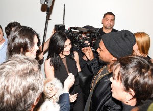 Kendall and Kylie Jenner with Kanye West at Kendall + Kylie Launch Party