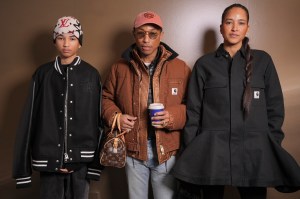 Rocket Williams, Pharrel Williams, Helen Lasichanh at the Sacai fashion show during Paris Fashion Week Menswear Fall 2025 on January 26, 2025 in Paris, France.