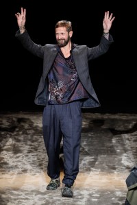 Stefano Pilati takes a bow at his last Ermenegildo Zegna show in Milan