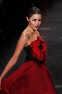 Olivia Culpo on the catwalk at Red for Women