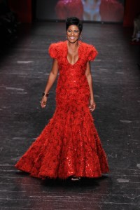 Tamron Hall on the catwalk at Red for Women