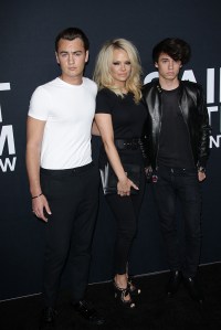 Brandon Lee, Pamela Anderson and Dylan Lee at Saint Laurent Fall 2016