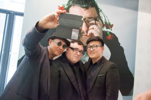 Alber Elbaz having his picture taken at Tsinghua University in Beijing.