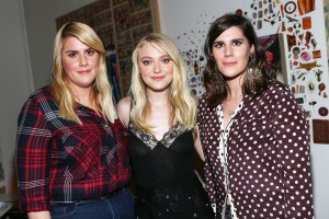 Dakota Fanning in Rodarte with the designers, Kate and Laura Mulleavy.