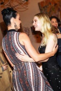 Katy Perry and Dakota Fanning, both in Rodarte.