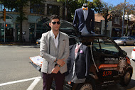 BookATailor's Jacomo Hakim and one of his Smart cars.