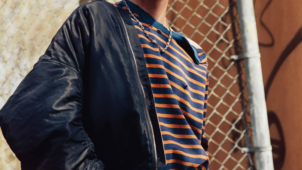 Faith Connexion’s nylon jacket, cotton T-shirt and denim jeans. Triton necklace.
