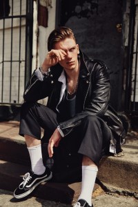 Faith Connexion’s leather jacket, Fear of God’s cotton shirt, tank top and pants and Second/ Layer’s virgin wool shirt around waist. Chrome Hearts necklace; Triton bracelet; Vans sneakers.