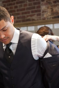 Trevor Noah getting fitted in an Ermenegildo Zegna made-to-measure suit for the Met Gala.
