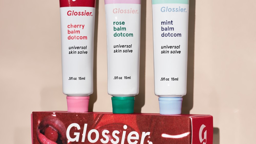 Glossier's Flavored Balm Dotcoms in cherry, rose and mint.