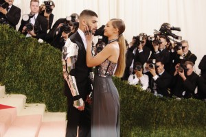 Zayn Malik in Versace and Gigi Hadid in Tommy Hilfiger.