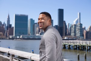 Michael Strahan wearing a look from MSX.