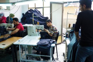 The tens of thousands of small-scale workshops, like those shown here, are the firms mainly employing refugees.