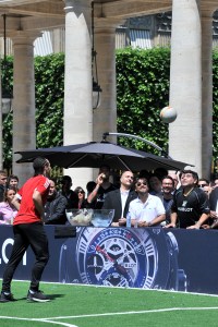 Diego Maradona watches a ball soaring out of the pitch Hublot