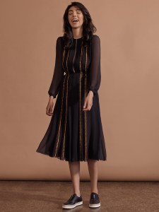 Zaineb Malick modeling a look from the "Love" shoe collection