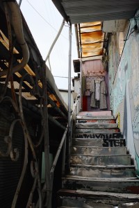 The warped stairwell up to Nincompoop Capacity.