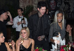 Travis Mills and Winnie Harlow at the Barneys Unravel Dinner