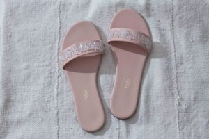 Crystal-embellished slides from Erin Fethertson's collaboration with Tkees