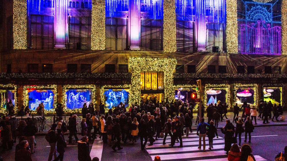 Holiday shopping outside Saks Fifth Avenue, NYC.