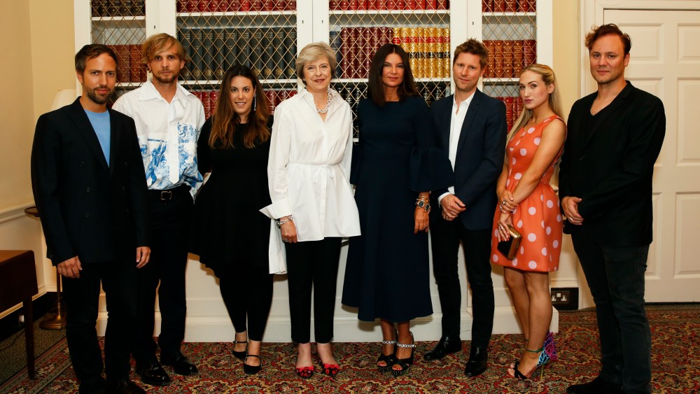 Peter Pilotto, Christopher de Vos, Mary Katrantzou, Theresa May, Natalie Massenet, Christopher Bailey, Sophia Webster and Nicholas Kirkwood