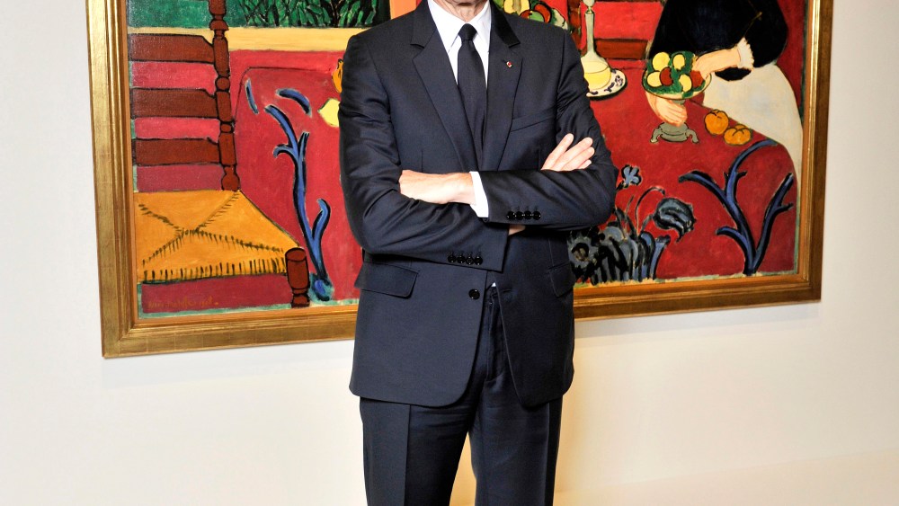 Bernard Arnault in front of the painting “Red Room (Harmony in Red)” (1908) by Henri Matisse.