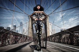 Jessica Minh Anh in Sebastian Gunawan jumpsuit on the Brooklyn Bridge, NYC.