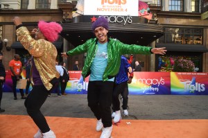 Rollerskating dancers in Troll Wigs.