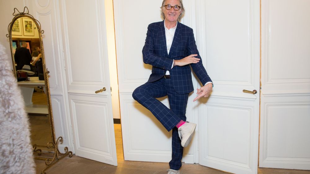 Paul Smith showing off John Tierney collaboration socks
