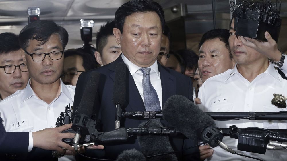 Lotte Group's chairman, Shin Dong-bin, center, was indicted on charges of embezzlement and tax evasion.