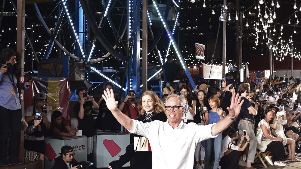 Tommy Hilfiger thanks the audience at his fall runway "carnival."