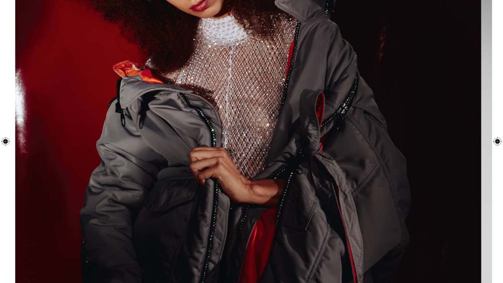 Y/Project's bomber jacket and fishnet top.